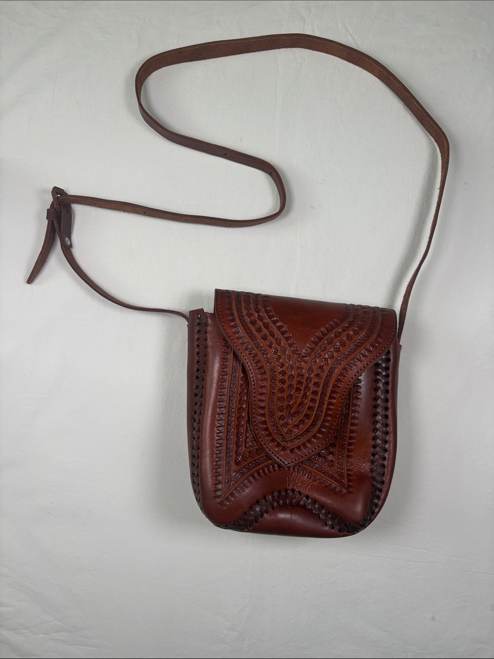 Artisan Brown Leather Crossbody Bag with Embossed Detail